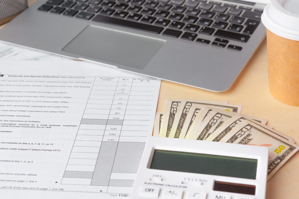 Showing business and financial report. Accounting, money close up